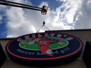Oval cabinet sign for Chilito's
